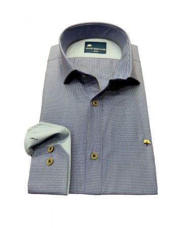 In a light blue shirt with a geometric pattern and special brown buttons