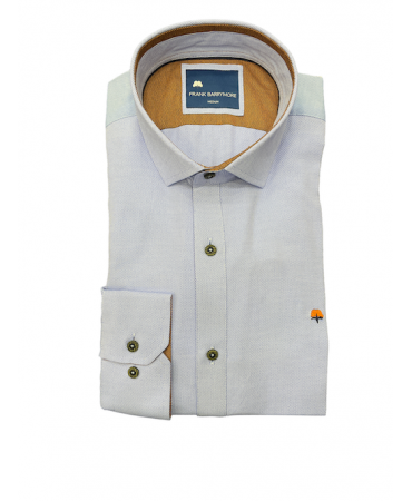 Light blue shirt with taupe color on the inside of the collar and cuffs