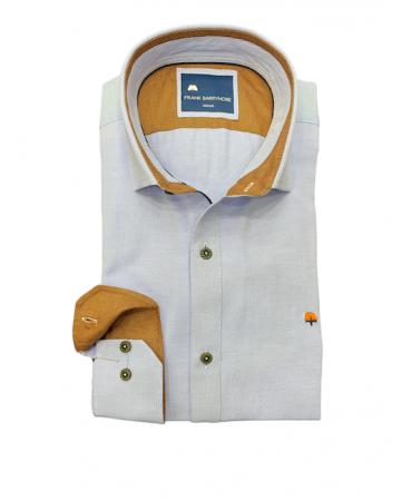 Light blue shirt with taupe color on the inside of the collar and cuffs
