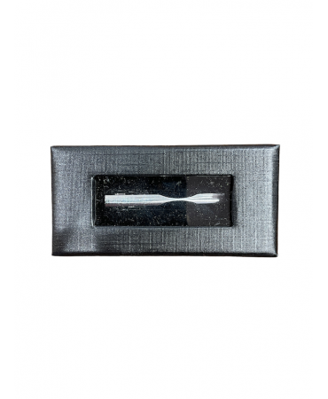 Makis Tselios tie pin with embossed facing brackets