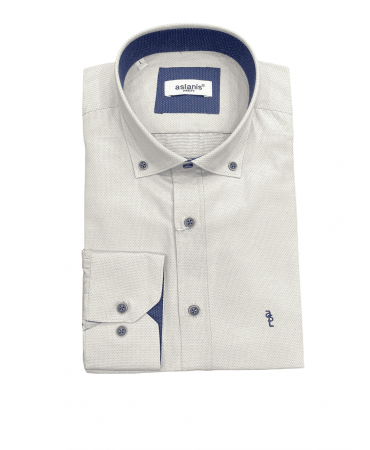 Aslanis shirt with blue polka dots on a beige base and very blue ends for the collar and the cuff